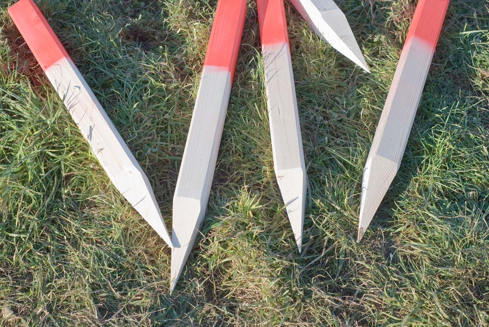 Survey Pegs On The Grass