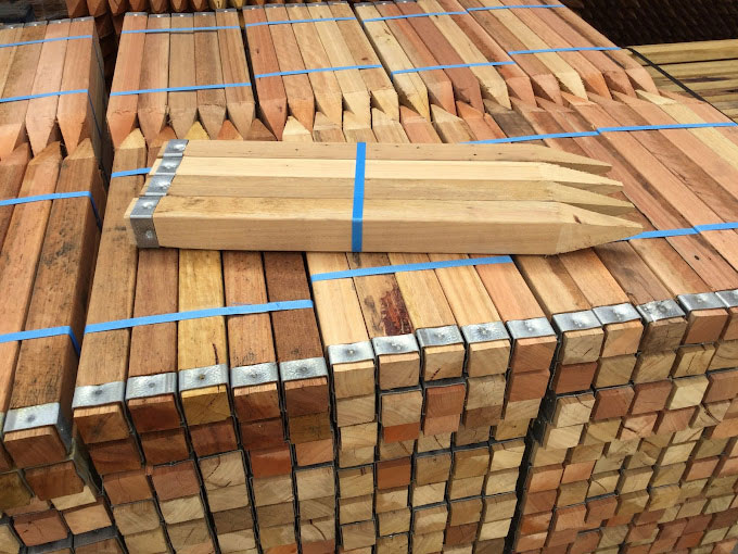 A Stack Of Wooden Survey Pegs
