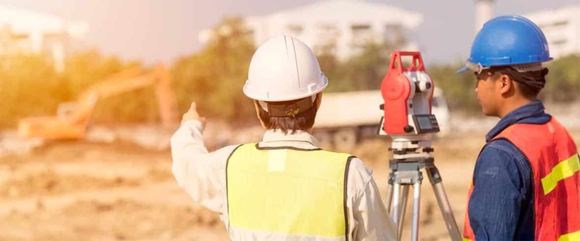 Two Surveyor Inspecting the Location — Premium Pegs for Surveying & More in Heatherbrae, NSW